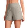 imageCRZ YOGA Womens Lightweight Mid Rise Hiking Shorts 4  Stretch for Athletic Summer Travel Outdoor Golf with Zip PocketsCliff Ash