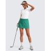 imageCRZ YOGA Womens High Waisted Tennis Skirts with 3 Pockets Golf A Line Lightweight Cute Athletic Casual SkortsCascadia Green