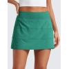 imageCRZ YOGA Womens High Waisted Tennis Skirts with 3 Pockets Golf A Line Lightweight Cute Athletic Casual SkortsCascadia Green