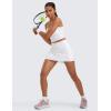 imageCRZ YOGA Womens High Waisted Tennis Skirts with 3 Pockets Golf A Line Lightweight Cute Athletic Casual SkortsWhite