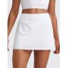 imageCRZ YOGA Womens High Waisted Tennis Skirts with 3 Pockets Golf A Line Lightweight Cute Athletic Casual SkortsWhite