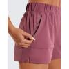 imageCRZ YOGA Womens Waterproof Stretch Hiking Shorts Mid Rise Summer for Outdoor Golf Workout with Zip Pockets Belt  3Misty Merlot