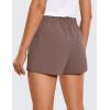 imageCRZ YOGA Womens Waterproof Stretch Hiking Shorts Mid Rise Summer for Outdoor Golf Workout with Zip Pockets Belt  3Purple Taupe