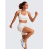 imageCRZ YOGA Womens Strappy Sports Bras Fitness Workout Padded Yoga Top Criss Cross Back CamiMilky White Bone