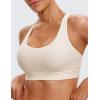 imageCRZ YOGA Womens Strappy Sports Bras Fitness Workout Padded Yoga Top Criss Cross Back CamiWhite Apricot