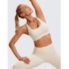 imageCRZ YOGA Womens Strappy Sports Bras Fitness Workout Padded Yoga Top Criss Cross Back CamiWhite Apricot