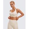 imageCRZ YOGA Womens Strappy Sports Bras Fitness Workout Padded Yoga Top Criss Cross Back CamiWhite Apricot
