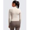 imageCRZ YOGA Butterluxe Womens Cropped Slim Fit Workout Jacket Weightless Track Athletic Full Zip Up Tops with Thumb HolesMojave Tan
