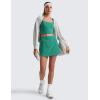 imageCRZ YOGA Dolphin Golf Skirts for Women A Line High Waisted Casual Athletic Mini Tennis Pickleball Skort with Zipper PocketCascadia Green