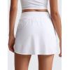 imageCRZ YOGA Dolphin Golf Skirts for Women A Line High Waisted Casual Athletic Mini Tennis Pickleball Skort with Zipper PocketWhite