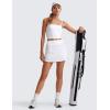imageCRZ YOGA Dolphin Golf Skirts for Women A Line High Waisted Casual Athletic Mini Tennis Pickleball Skort with Zipper PocketWhite