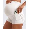 imageCRZ YOGA Women 2 in 1 Maternity Workout Shorts Over Belly 3  Dolphin Soft Athletic Running Casual Pregnancy with PocketsMilky White