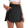imageCRZ YOGA Dolphin Golf Skirts for Women A Line High Waisted Casual Athletic Mini Tennis Pickleball Skort with Zipper PocketBlack