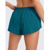 imageCRZ YOGA Womens Running Shorts Low Waisted 25quot  Mesh Liner Quick Dry for Track Gym Athletic Workout with Zip PocketBorealis Green
