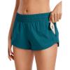 imageCRZ YOGA Womens Running Shorts Low Waisted 25quot  Mesh Liner Quick Dry for Track Gym Athletic Workout with Zip PocketBorealis Green
