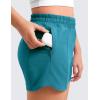imageCRZ YOGA Girls Athletic Shorts with Zipper Pocket for Teens Kids Running Workout Casual Tennis Soccer Lightweight LinerBorealis Green