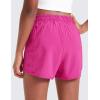imageCRZ YOGA Girls Athletic Shorts with Zipper Pocket for Teens Kids Running Workout Casual Tennis Soccer Lightweight LinerHibiscus Purple