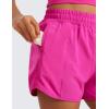 imageCRZ YOGA Girls Athletic Shorts with Zipper Pocket for Teens Kids Running Workout Casual Tennis Soccer Lightweight LinerHibiscus Purple