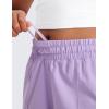 imageCRZ YOGA Girls Athletic Shorts with Zipper Pocket for Teens Kids Running Workout Casual Tennis Soccer Lightweight LinerLilac
