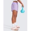 imageCRZ YOGA Girls Athletic Shorts with Zipper Pocket for Teens Kids Running Workout Casual Tennis Soccer Lightweight LinerLilac