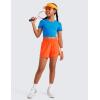 imageCRZ YOGA Girls Athletic Shorts with Zipper Pocket for Teens Kids Running Workout Casual Tennis Soccer Lightweight LinerNeon Orange