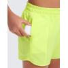 imageCRZ YOGA Girls Athletic Shorts with Zipper Pocket for Teens Kids Running Workout Casual Tennis Soccer Lightweight LinerNeon Yellow