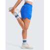 imageCRZ YOGA Girls Athletic Shorts with Zipper Pocket for Teens Kids Running Workout Casual Tennis Soccer Lightweight LinerSparkle Blue