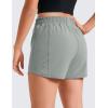 imageCRZ YOGA Girls Athletic Shorts with Zipper Pocket for Teens Kids Running Workout Casual Tennis Soccer Lightweight LinerSterling