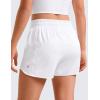 imageCRZ YOGA Girls Athletic Shorts with Zipper Pocket for Teens Kids Running Workout Casual Tennis Soccer Lightweight LinerWhite
