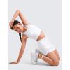 imageCRZ YOGA Girls Athletic Shorts with Zipper Pocket for Teens Kids Running Workout Casual Tennis Soccer Lightweight LinerWhite