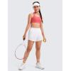 imageCRZ YOGA Girls Athletic Shorts with Zipper Pocket for Teens Kids Running Workout Casual Tennis Soccer Lightweight LinerWhite