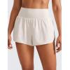 imageCRZ YOGA High Waisted Running Shorts for Women Ruffled Trim Tummy Control for Athletic with Mesh Liner Zip PocketMilky White Bone