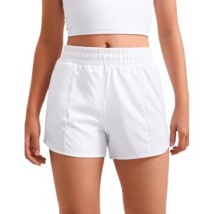 imageCRZ YOGA Girls Athletic Shorts with Zipper Pocket for Teens Kids Running Workout Casual Tennis Soccer Lightweight LinerWhite