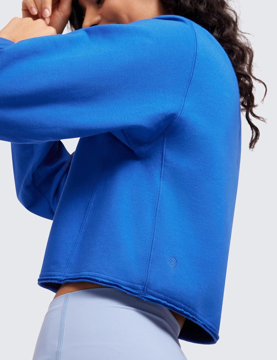 imageCRZ YOGA Womens Fleece Cropped Sweatshirts Crewneck Long Sleeve Double Raw Hem Workout Casual Pullover TopsSparkle Blue