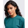 imageCRZ YOGA Womens Fleece Cropped Sweatshirts Crewneck Long Sleeve Double Raw Hem Workout Casual Pullover TopsGreen Jade