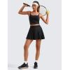 imageCRZ YOGA Womens Mini Pleated Athletic Tennis Skirts High Waisted A Line Golf Pickleball Casual Skort with Inner PocketsBlack