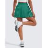 imageCRZ YOGA Womens Mini Pleated Athletic Tennis Skirts High Waisted A Line Golf Pickleball Casual Skort with Inner PocketsCascadia Green