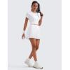 imageCRZ YOGA Womens Mini Pleated Athletic Tennis Skirts High Waisted A Line Golf Pickleball Casual Skort with Inner PocketsWhite