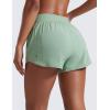 imageCRZ YOGA Mid Waisted Running Shorts for Women 3quot Curved Hems for Athletic Workout Gym with Zipper Pockets LineGreen Palm Court