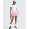 imageCRZ YOGA Mid Waisted Running Shorts for Women 3quot Curved Hems for Athletic Workout Gym with Zipper Pockets LineVita Pink