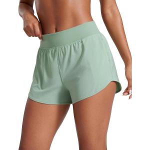 imageCRZ YOGA Mid Waisted Running Shorts for Women 3quot Curved Hems for Athletic Workout Gym with Zipper Pockets LineGreen Palm Court