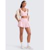 imageCRZ YOGA Bubble High Waisted Tennis Skirts for Women Casual Athletic Mini Ruffled Hem Balloon Skort with Side PocketsStrawberry Pink