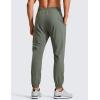 imageCRZ YOGA Athletic Joggers for Men  29quot Lightweight Running Training Pants with Zip Pockets and Ankle ZippersGrey Sage