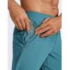 imageCRZ YOGA Athletic Joggers for Men  29quot Lightweight Running Training Pants with Zip Pockets and Ankle ZippersWashed Blue