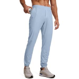 imageCRZ YOGA Athletic Joggers for Men  29quot Lightweight Running Training Pants with Zip Pockets and Ankle ZippersCambric Blue