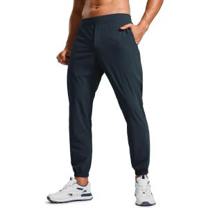 imageCRZ YOGA Athletic Joggers for Men  29quot Lightweight Running Training Pants with Zip Pockets and Ankle ZippersTrue Navy