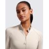 imageCRZ YOGA Butterluxe Womens Cropped Slim Fit Workout Jackets  Weightless Track Athletic Full Zip Jacket with Thumb HolesMojave Tan