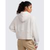 imageCRZ YOGA Womens Fleece Lined Half Zip Hoodies Pullover Oversized Long Sleeve Casual Workout Sweatshirts with Thumb HolesMilky White Bone