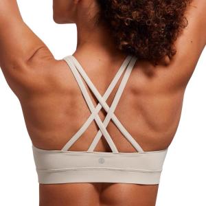 imageCRZ YOGA Womens Strappy Sports Bras Fitness Workout Padded Yoga Bra Criss Cross BackMojave Tan