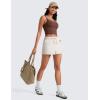 imageCRZ YOGA Stretch Shorts for Women Work Casual 25  Athletic Shorts with Pockets for Workout Travel Hiking GolfMilky White Bone